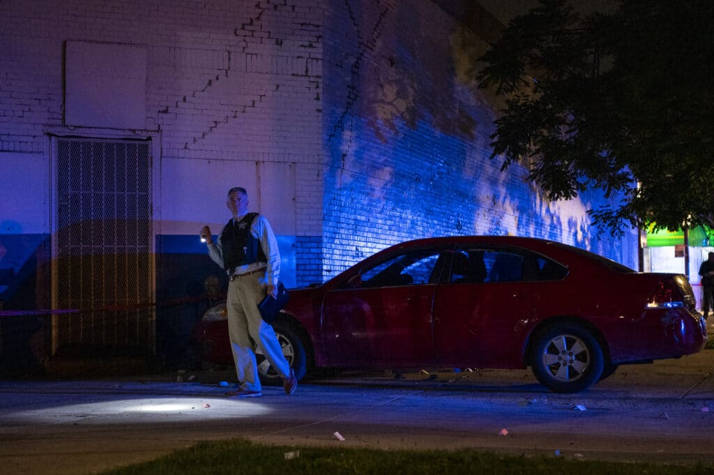 Two separate shootings left two people dead and at least 15 wounded in Chicago,