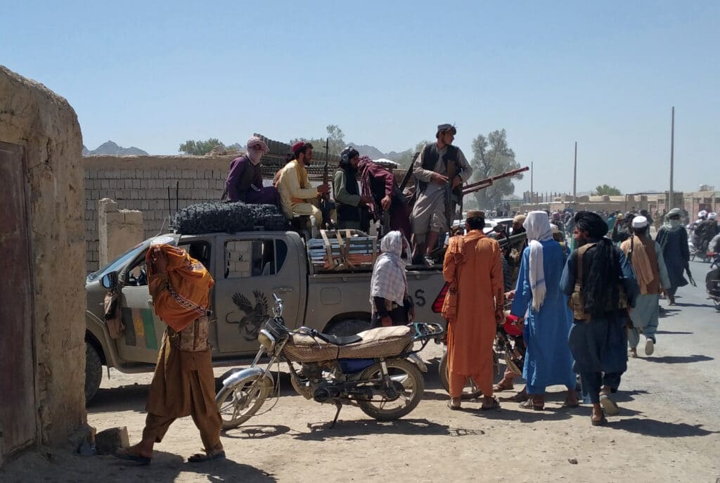 Taliban fighters patrol inside the city of Farah, capital of Farah province, southwest Afghanistan,