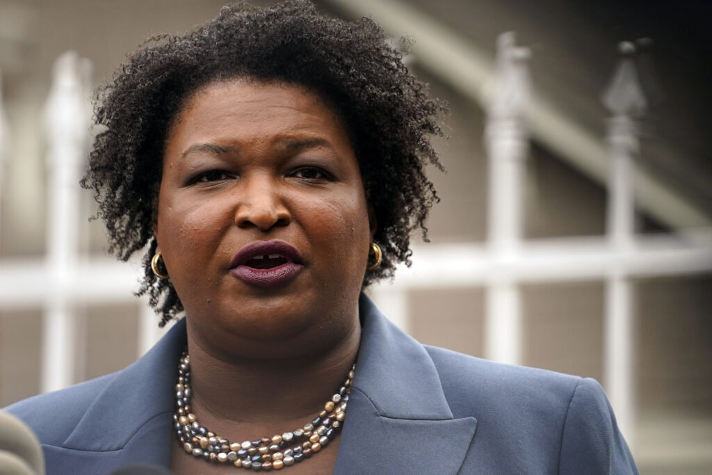 Abrams aims to win back Dems who voted in Ga.'s GOP primary