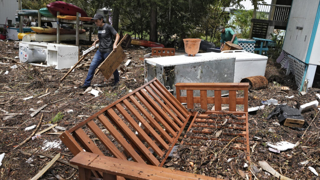 Residents pick through rubble, navigate clogged roads after Idalia