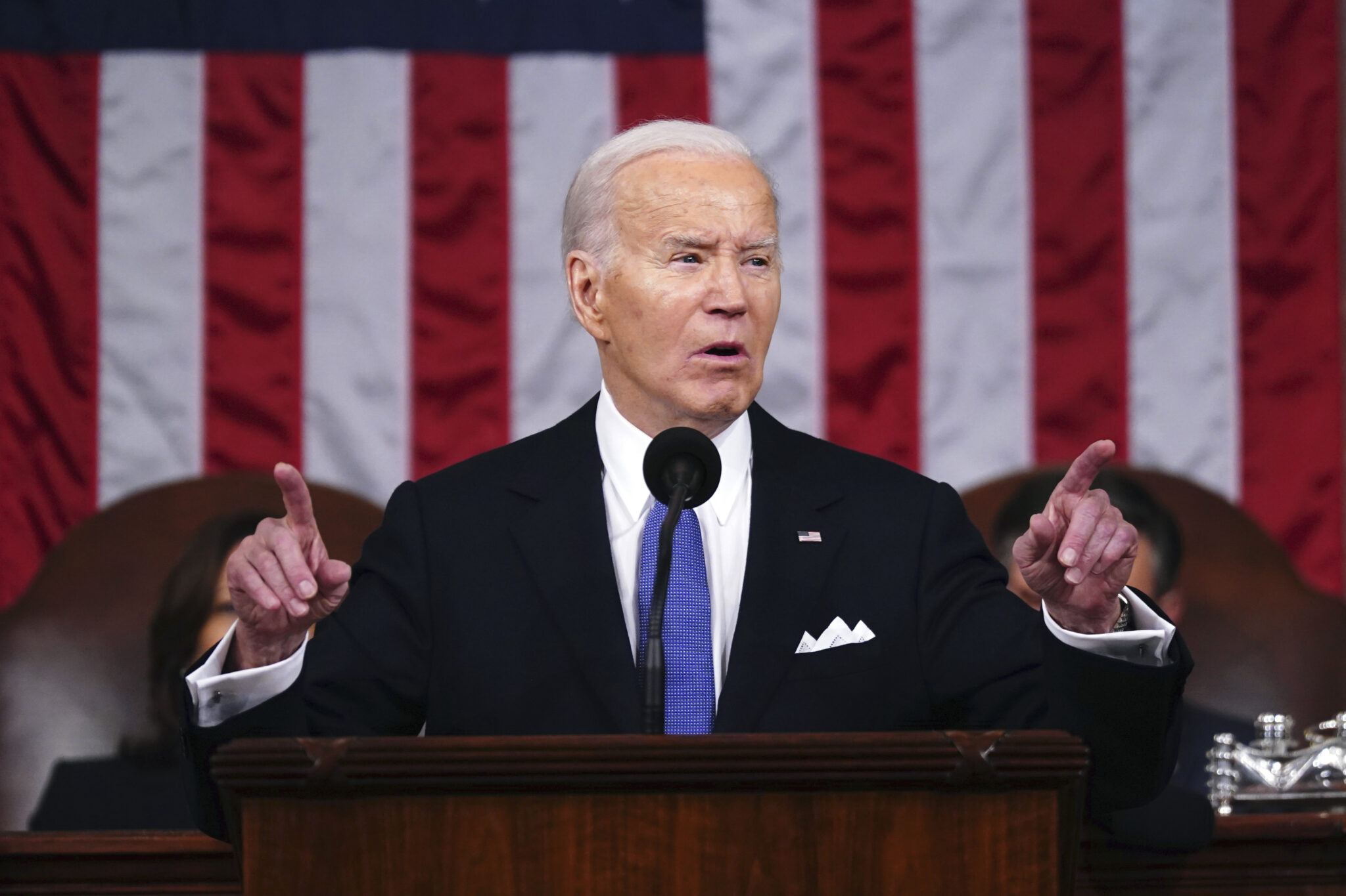 Biden signs a PKG of spending bills passed by Congress into law