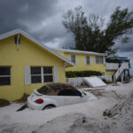 FL Residents Face Massive Sand Cleanup After Twin Hurricanes