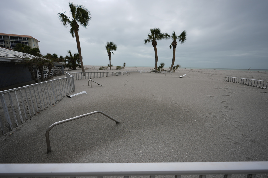 FL Residents Face Massive Sand Cleanup After Twin Hurricanes