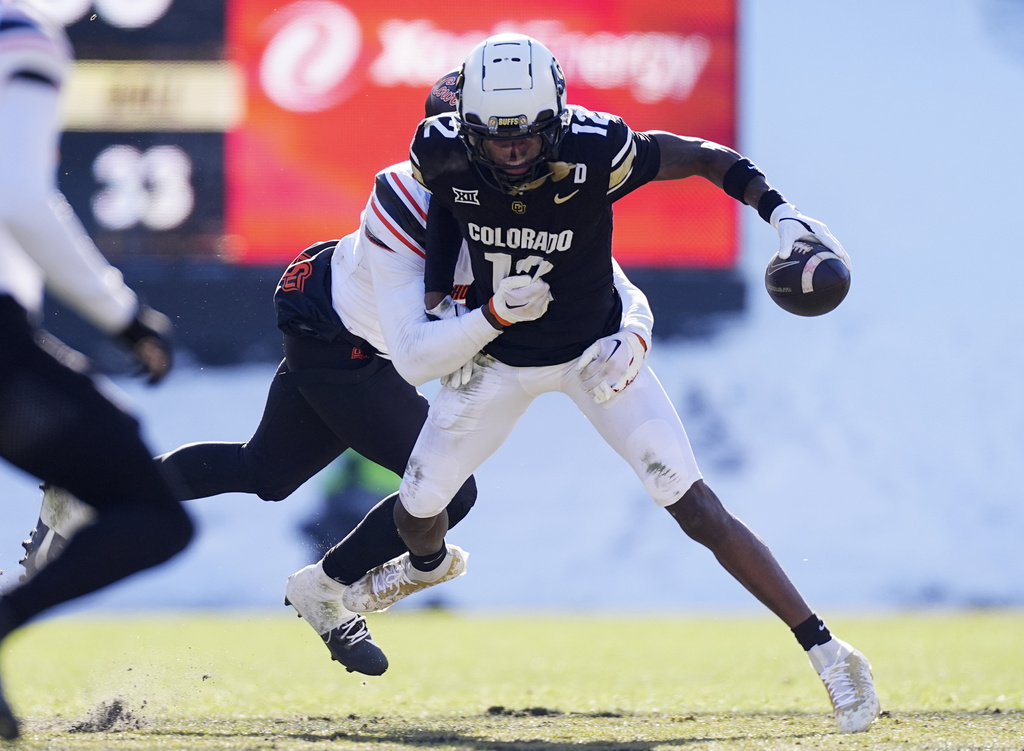 Travis Hunter Shines as Colorado Dominates Oklahoma State 52-0