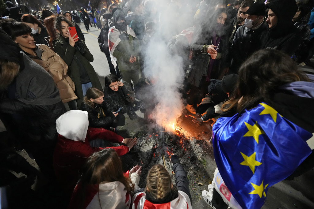 Georgian Police Raid Opposition Amid Mass Protests