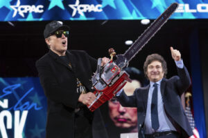 Elon Musk Wields Chainsaw, Slams Democrats at CPAC Event