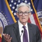 Federal Reserve Forecasts Slower Growth, Higher Inflation