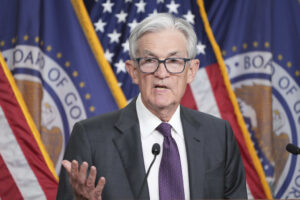 Federal Reserve Forecasts Slower Growth, Higher Inflation